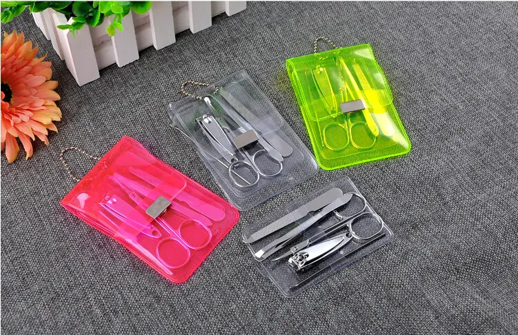 Di alta Qualità In Acciaio Inox Set La Cura Delle Unghie Pedicure Forbici Pinzette Coltello Ear Pick Utility Tagliaunghie Kit Manicure Set