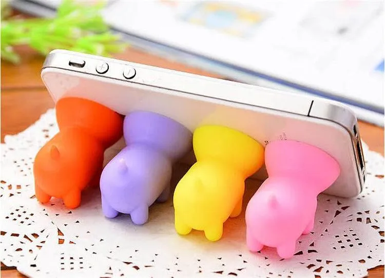 1000 unids Pure Silica Gel Multi Color Pig Sucker Holder Soporte para Coche Móvil para Iphone 4s 4 3g 3gs Accesorio Del Teléfono Envío Gratis