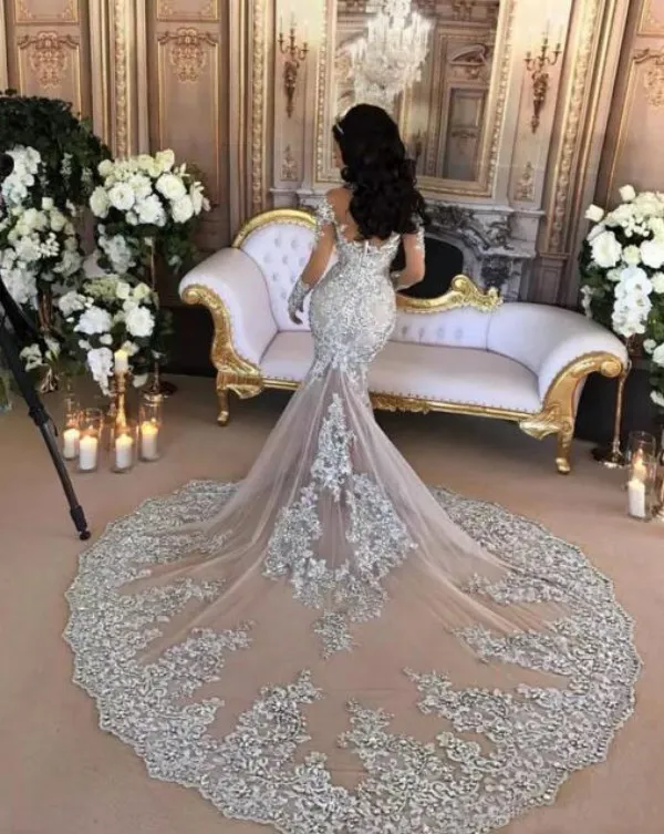 Luxury Wedding Dress Sexy Sheer Bling Beaded Lace Appliques High Neck Illusion Long Sleeve Champagne Ivory White Mermaid Bridal Gowns