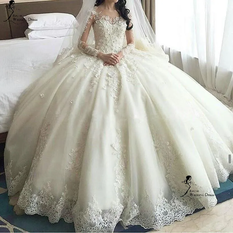 Robes de mariée robe de bal en dentelle à manches longues avec train cathédrale Applique perlée pure cou Tulle Puffy Chine Robes de mariée sur mesure