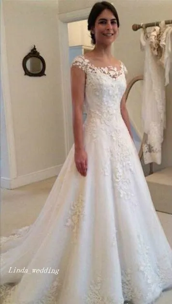 2019 Modeste Nouvelle Dentelle Appliques Robe De Mariée Arabe A-ligne Longue Voir À Travers Bouton Retour Robe De Mariée Plus La Taille Sur Mesure Vestidos De noiva