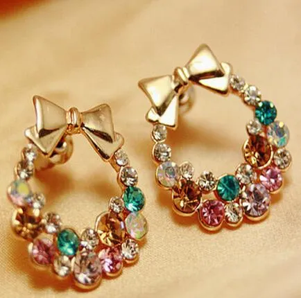 Personlighet Mode Smycken Örhängen Rhinestone Wreath Bowknot Stud Alloy Örhängen för Kvinna