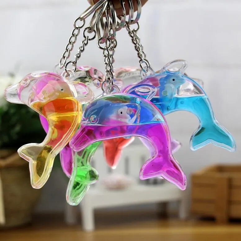 Dolphins floating bag pendant oil leak cartoon small gift creative key ring key ring aquarium gift KR349 Keychains mix order 20 pieces a lot