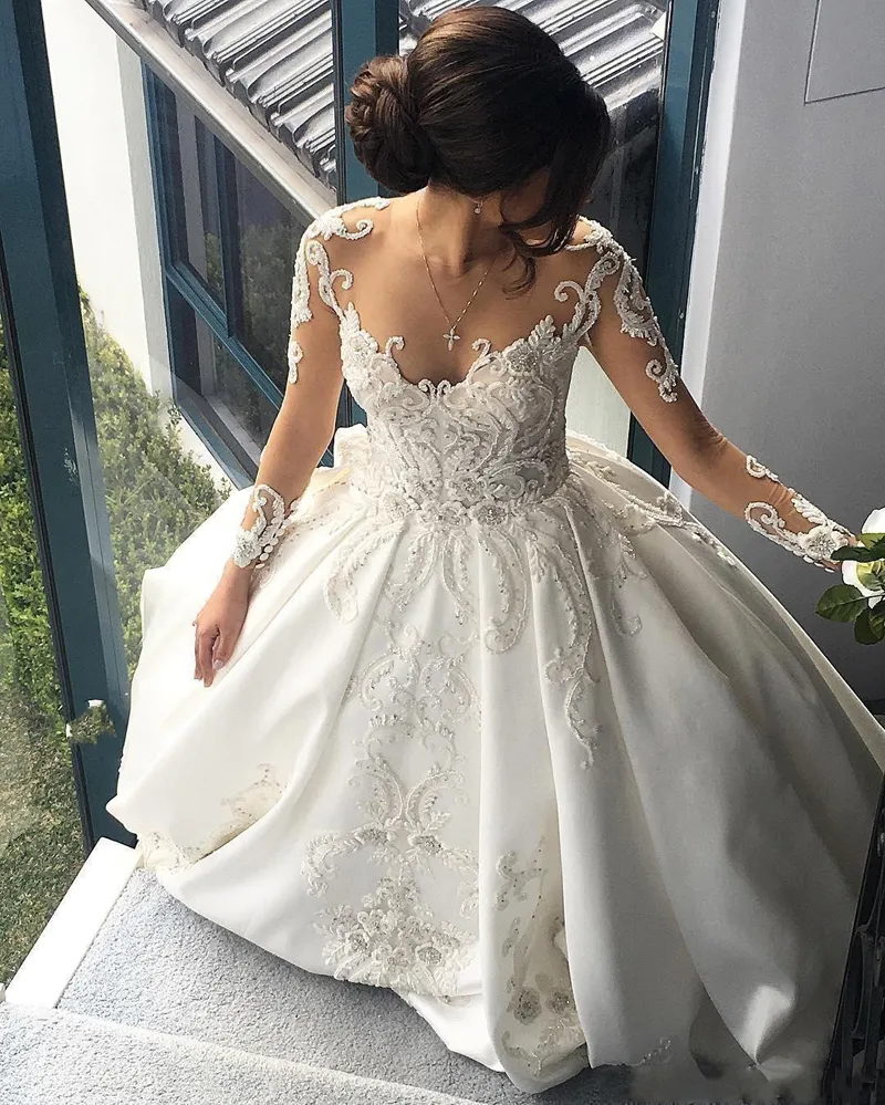 2016 Vintage Robes De Mariée De Luxe Manches Longues Une Ligne Illusion Dentelle Perlée Appliques Cathédrale Train Plus La Taille Robes De Mariée