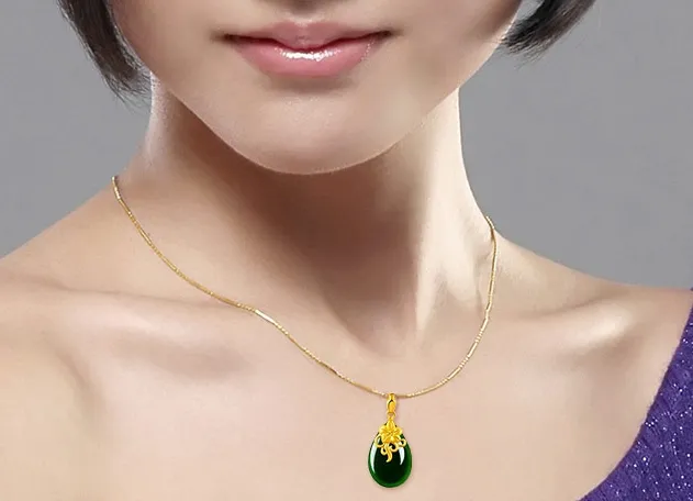 Gold set with green jade necklace The bubble-shaped orchids blooming flowers. Necklace pendant.