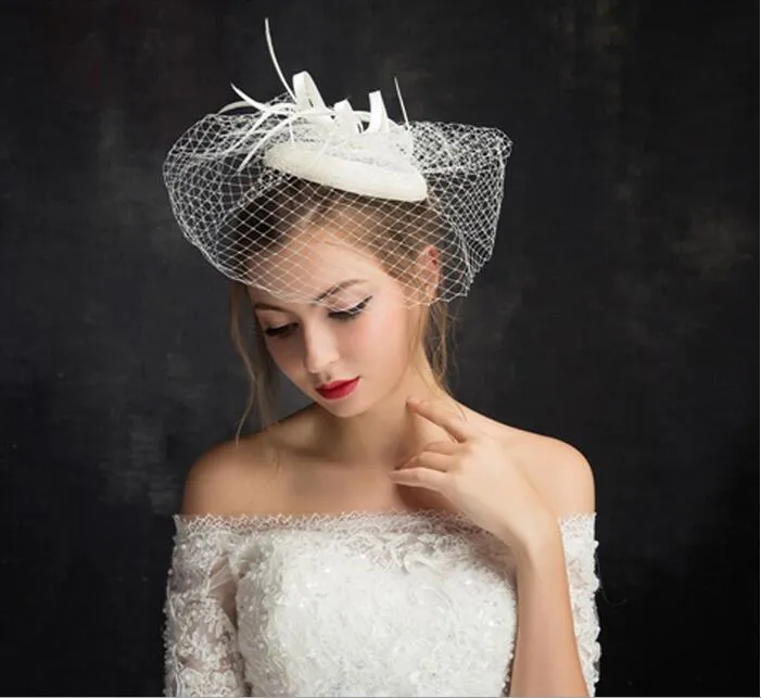 2019 Nouveaux belles chapeaux de mariée ivoire de haute qualité oiseaux de haute qualité plumes de fleur de bride fascinator mariée mariage visage christor chapeaux voiles