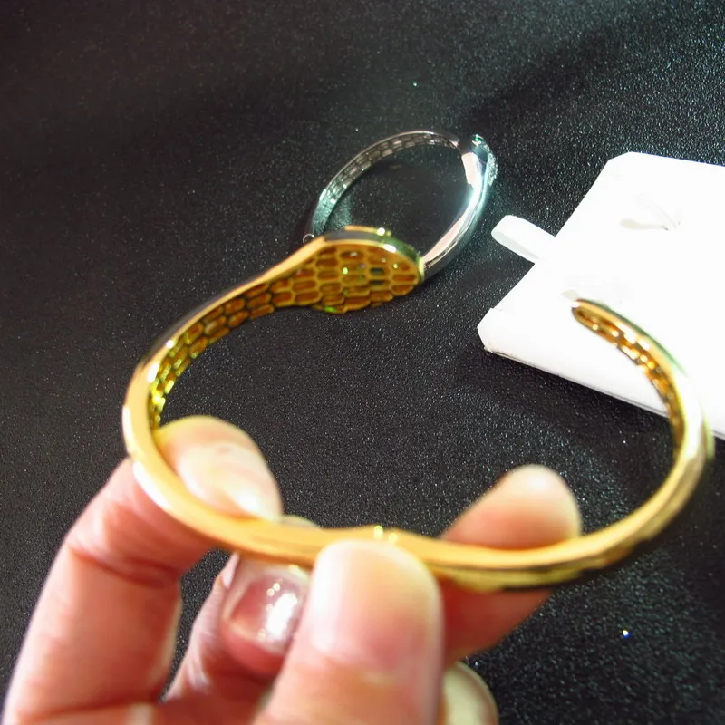 wholesale Haute qualité Mode yeux verts CZ diamant manchette bracelet bracelet designer cuivre bijoux de fête plaqué or 18 carats pour les femmes9026369