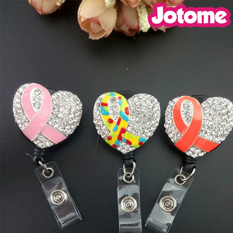 Avaliable Promotional I lager Rosa Rhinestone Ribbon Heart Retractable Reel / ID Badge Holder för sjuksköterskort