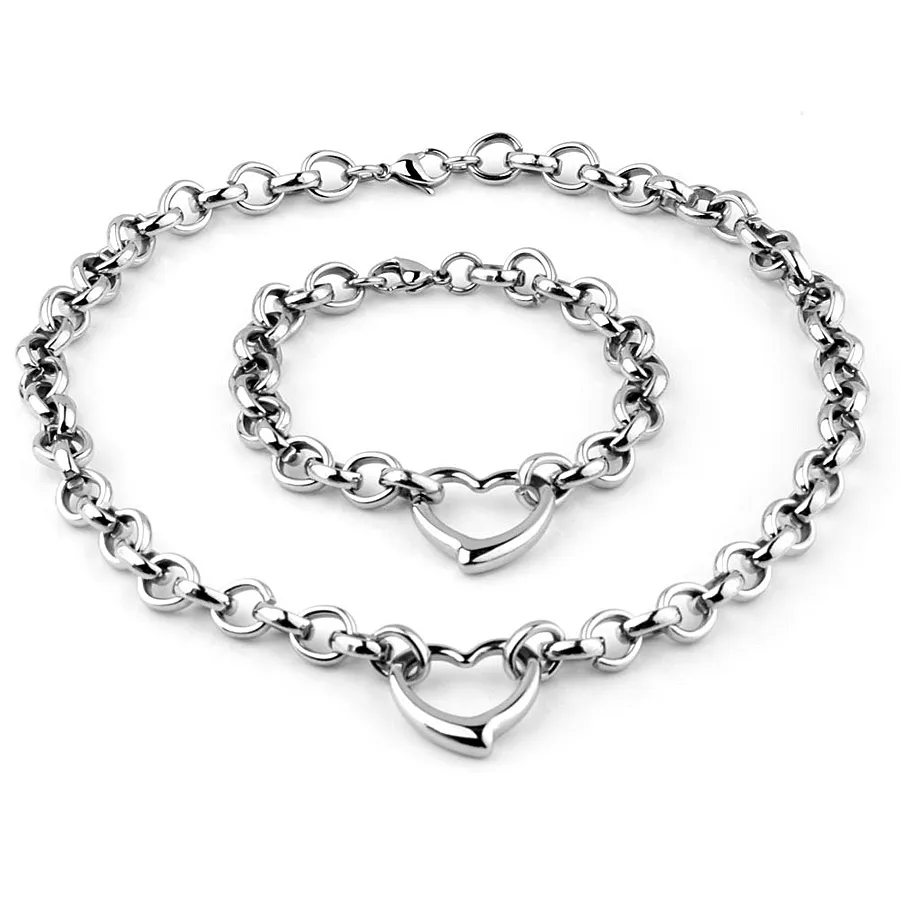 Set di 2 pezzi in acciaio al titanio Gioielli Collana da uomo Bracciale da donna Bracciale rigido in argento dorato Catena a maglie O lucidate Catene con ciondoli a cuore