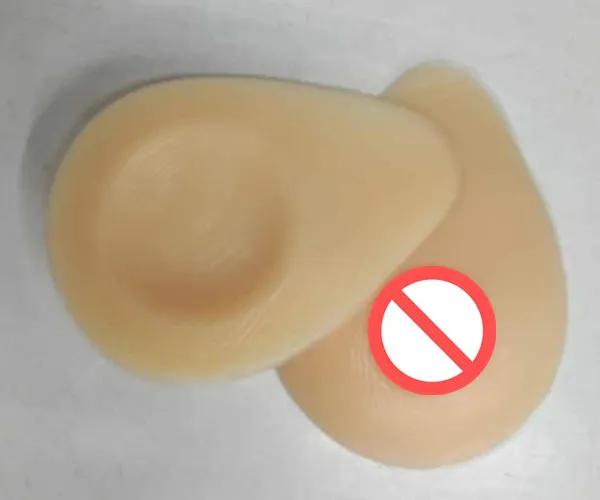 Frete grátis 2018 venda quente formas de mama de silicone triângulo em forma de lágrima para travesti transgênero prótese artificial 300-1400 g / par
