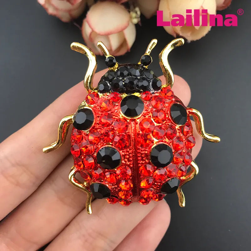 Broche coccinelle sur trèfle Au Bonheur des Coccinelles
