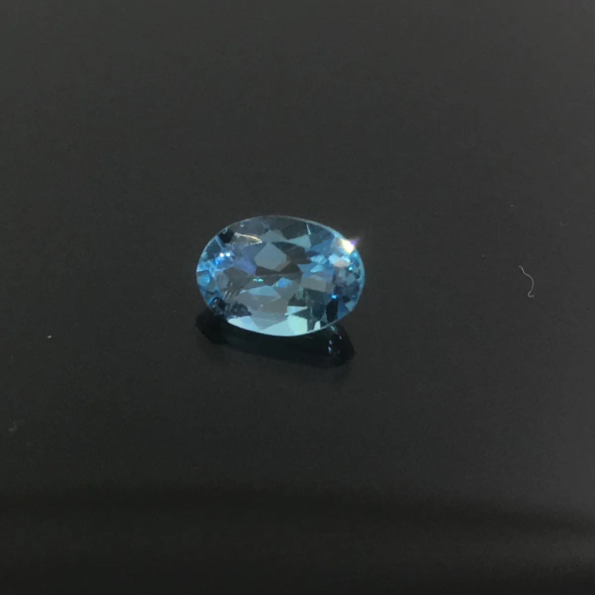 Promoção topa qualidade luz azul topázio natural pedra solta gem para anel brinco ou pingente de 5 mm * 7 mm de peso é de pedra calcária de topázio de 0,6 ct
