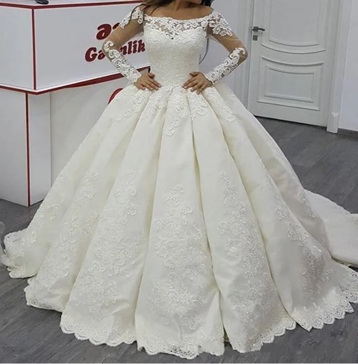 Vintage Satin Ballgown Satin Wedding Dresses with Illusion Long Sleeves, Boat Neck, Puffy Ivory Appliques, and See-Through Bridal Groom