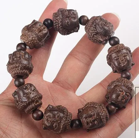 Minchas de madeira de sandália Gravura manual Shakya Muni Buda Head Bracelet na mão Buda de madeira Buda