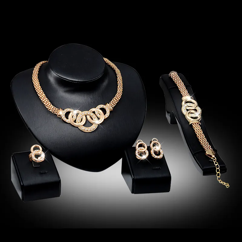 Mode lyxkristall handbojor halsband örhängen armband ring set metall guldpläterad rhinestone unika åtta cirkel kors smycken set