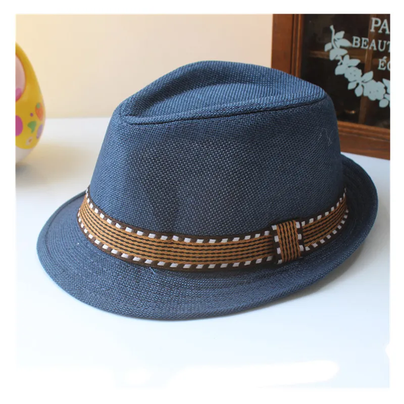 Été unisexe enfants paille Fedora Sunhat plage mode Panama casquette avec garniture de ruban enfants Soild Trilby chapeaux pour garçon et fille