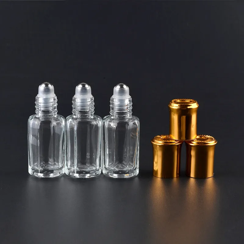 3ml 6ml 10ml åttkantigt glasflaskor med rulle på aromflaskor metallboll parfym eteriska oljepaketflaskor påfyllningsbart fall za1623