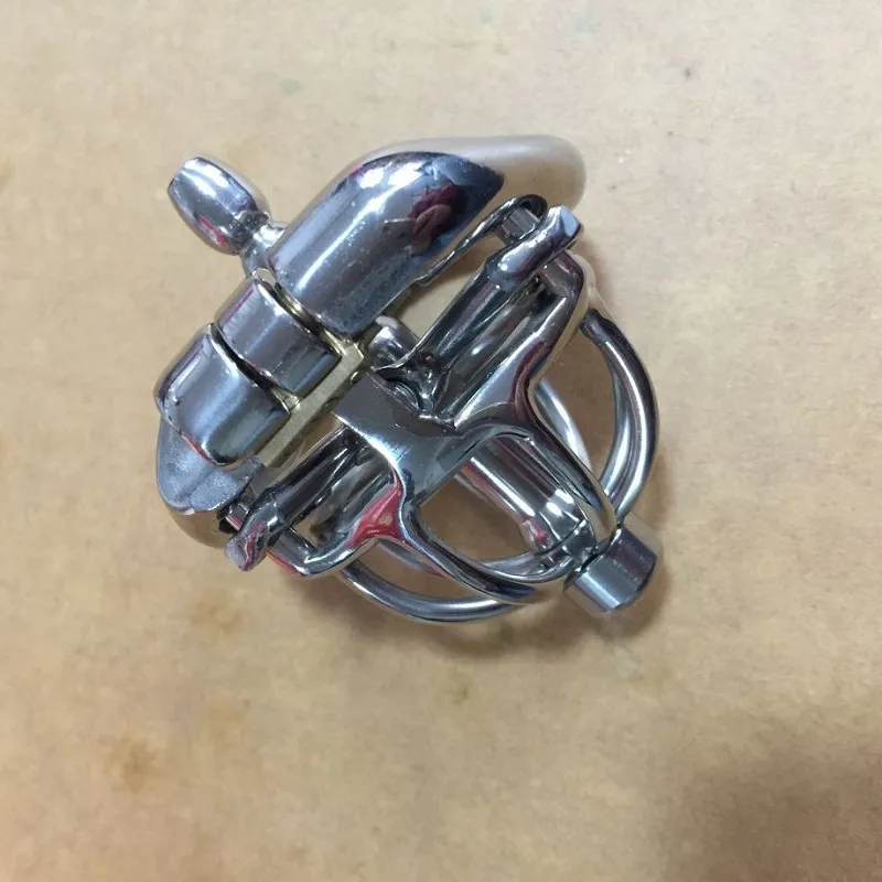Magic Lock Nya enheter med spikar Anti-off ring rostfritt stål super liten manlig enhet kort kuk bur för män båge2486933