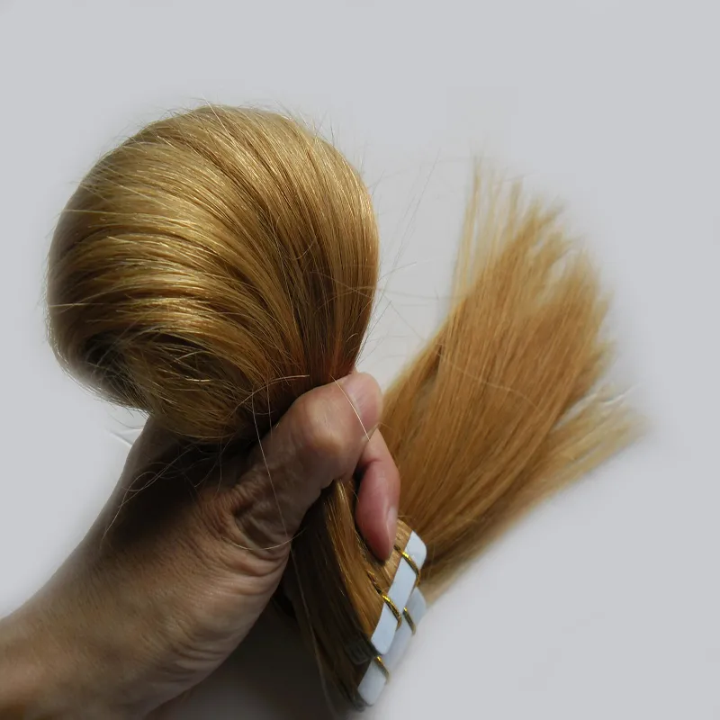 Brasilianska Virgin Hair Honey Blonde Skin Weft Hårförlängningar Dubbelsidigt tejp i mänskligt hår 40 st 100g