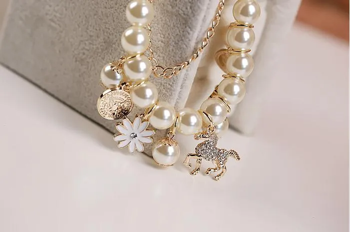 Discount Pearl Bracelet Little Rocking Horse petal Flower Figure Head Mix Fashion Multistorey Korean nice bracelet for girl women party