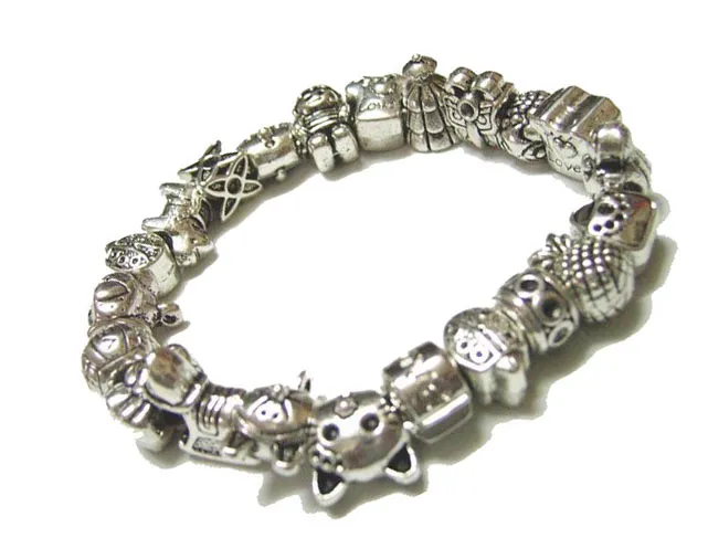 50 unids / lote mezcla estilo tíbet plata metales encanto perlas sueltas para bricolaje europeo brazalete pulsera joyería regalo de artesanía C18 envío gratis