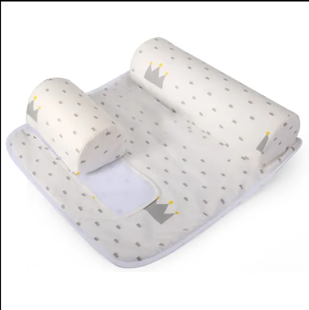 2017 nouveau bébé infantile nouveau-né sommeil positionneur Anti rouleau oreiller avec housse de drap + oreiller 2 pièces ensembles