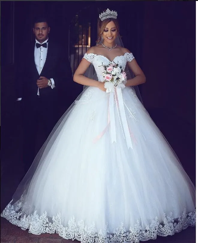 2020 New Modest Cheap Arabic Ball Gown Wedding Dresses Plus Size Lace Applique Off Shoulder Puffy Tulle Sweep Train Formal Bridal Gowns