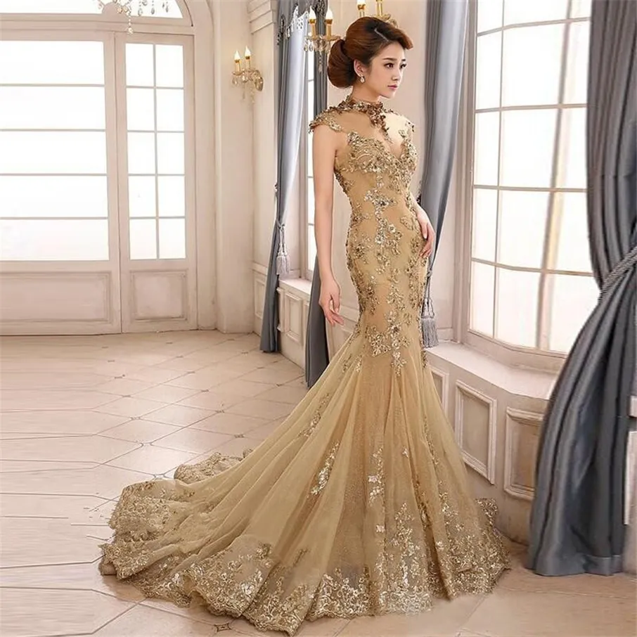 Vintage 2019 Champagne Mermaid Prom Dress Sheer Collo alto Ritagli Backless Cap Sleeve Abito da sera con applicazioni di paillettes