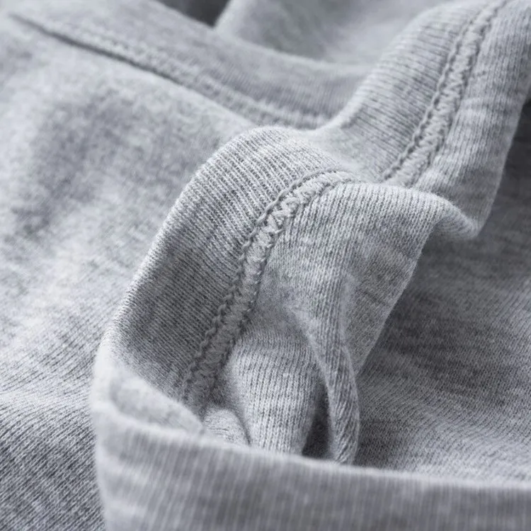 最新の到着メンズタンクトップワイドショルダーベスト純粋な綿の男のボトムネジシャツグラマースリムソフトTM018メンズタンクトップ