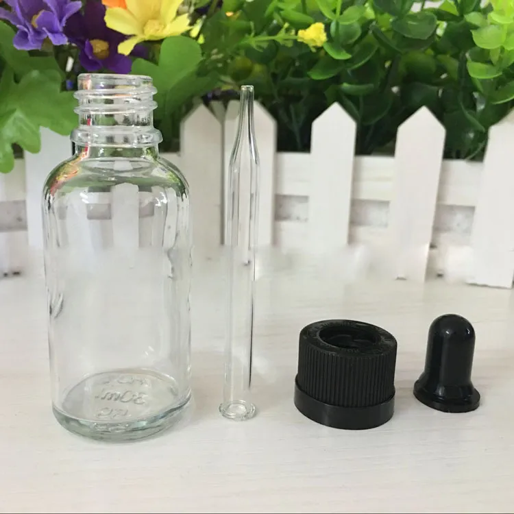 Großhandel /Los Amber Green Blue Clear 30 ml leere Glas -Tropfen -Flaschen mit kindlicher Sicherheitskappe für essentielle flüssige freie DHL