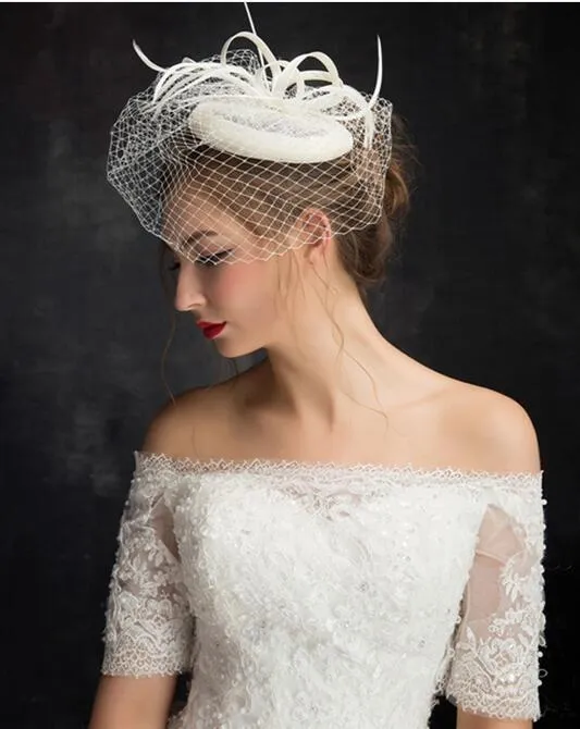 2019 Nouveaux belles chapeaux de mariée ivoire de haute qualité oiseaux de haute qualité plumes de fleur de bride fascinator mariée mariage visage christor chapeaux voiles