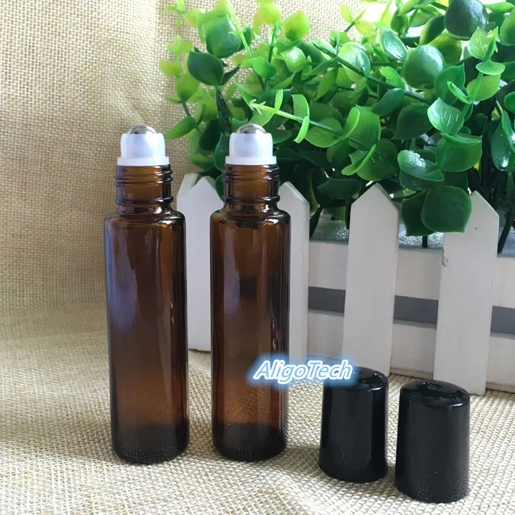 600 sztuk / partia Amber Glass Roll On Bottle 15ml (1 / 2oz) Essential Oil Pusty Aromaterapia Perfumy Butelka 15ml z metalową piłką DHL DHL