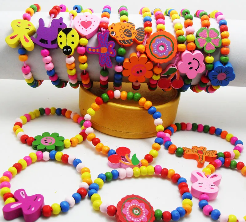 60pcs Kids Girls Wood Bracelets الأطفال معصمين 12 تصميمًا