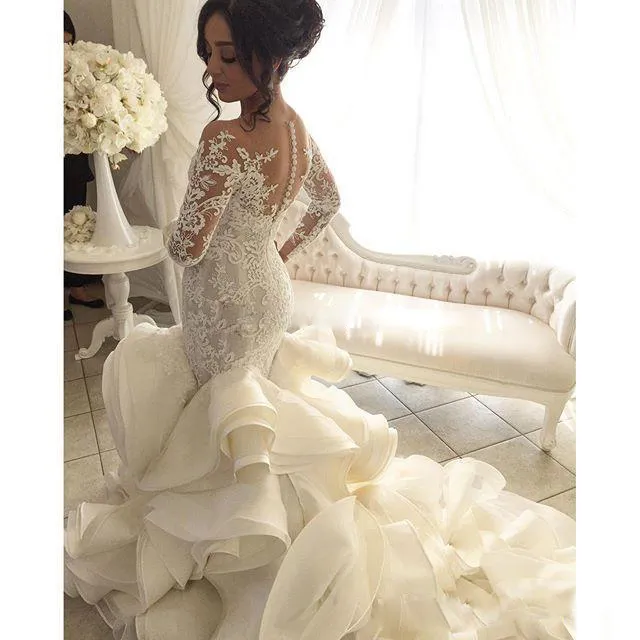 See Through Neckline Wedding Gowns Lace Appliques Long Sleeve Backless Bridal Dresses Fashion Tiered Cascading Ruffles Long Wedding Dresses