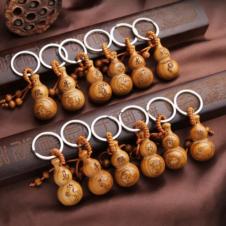 Gourd Key Ring Pendant Tolfte Zodiac Solid Wood Keychain Creative Present Bil Nyckelring Ornaments KR107 Nyckelringar Blanda Beställ 20 stycken Mycket