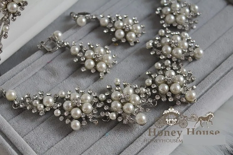 Set di 3 accessori gioielli da sposa matrimonio corona + orecchini + collana Design con foglie di cristallo con perle finte