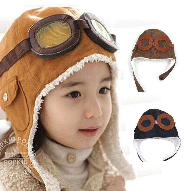 Venta al por mayor de pendientes de invierno para bebé, niño, niña, niño, pilotos, gorra de pilotos, gorros de frijoles suaves cálidos, guisantes neutros cálidos para niños