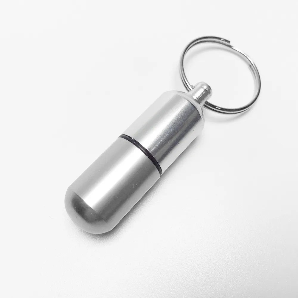 Novo Mini À Prova D 'Água de Alumínio Medicina Pill Box Holder Bottle Container car Keychain Car-styling De Armazenamento