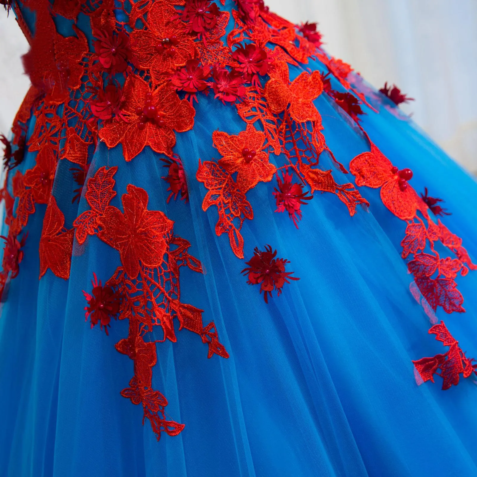 Blue Beaded Lace dark Blue wedding dress with Deep V-Neck and Colorful Deep Neckline - Imported from China Blue Beaded Lace dark Blue wedding dress with Deep V-Neck and Colorful Deep Neckline - Imported from China