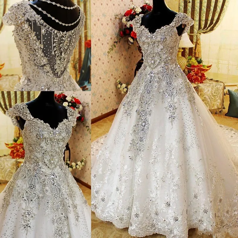 Bling Bling Heavy Beading Bröllopsklänningar 2018-2019 Kristaller Beaded A Line Bridal Gowns Lace Sweep Train Bröllop Vestidos Anpassad