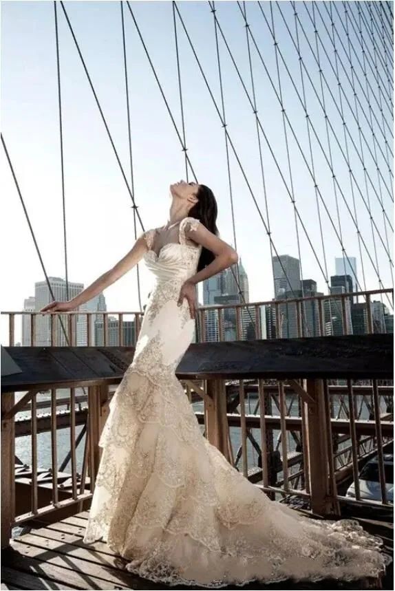 Romantic Backless Mermaid Lace Mermaid wedding dress with Bling Lace and Crystal Accents - Pnina Tornai 2020 Collection