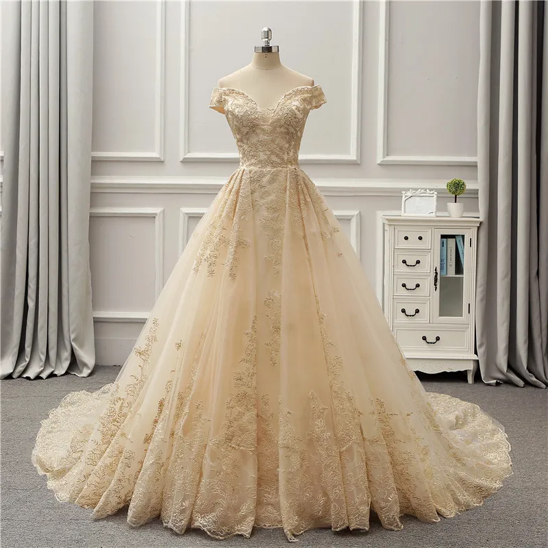 Abiti da sposa champagne con spalle scoperte con ricami Abiti da sposa fantasia a trapezio Abiti da sposa su misura con lacci sul retro