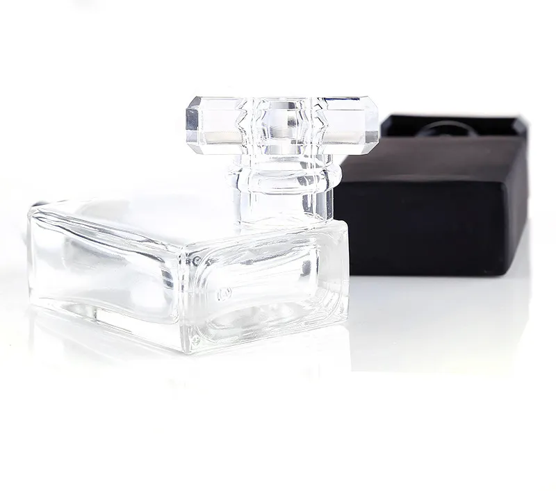 Fabrikspris 30ml bärbar klart svart parfymflaskor påfyllningsbar glas parfymflaska atomizer glas spray flaskor 30ml till salu