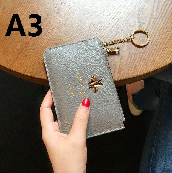 2019 Women039s Wallet Rectangle Genuine Leather Women039s Billfold Zero Borse Small Dai libri portafogli Bag di carta Honeybee Shor6608014