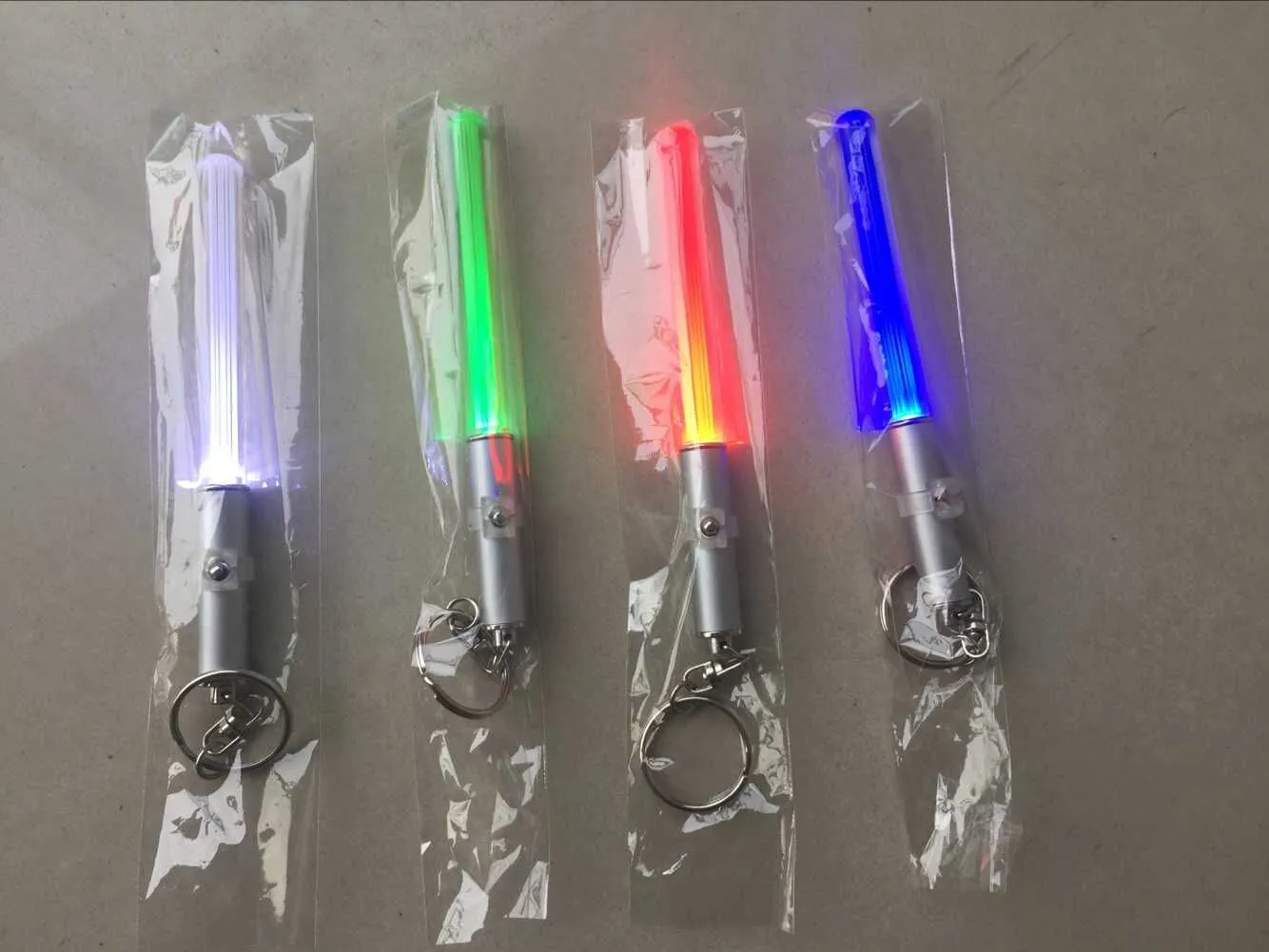 Durable Glow Pen Flash Torch Magic Wand Stick Lightsaber Keychain LED Light