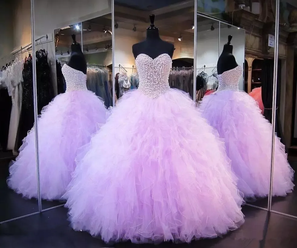 2018 Ny lavendel quinceanera klänningar bollkakor Korsettkristaller pärlor Ruffles Tulle spets upp Back Pageant-klänningar för tjejer Q43