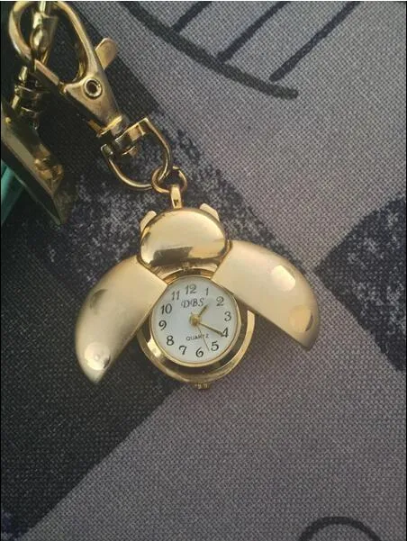 Божья коровьи карманные кольцо кольцо мини -подвесной часы Смотреть золотые жуки -ледяные сумки на циферблат Quartz Аналоговые карманные часы Gold Wings Lobster K2123912