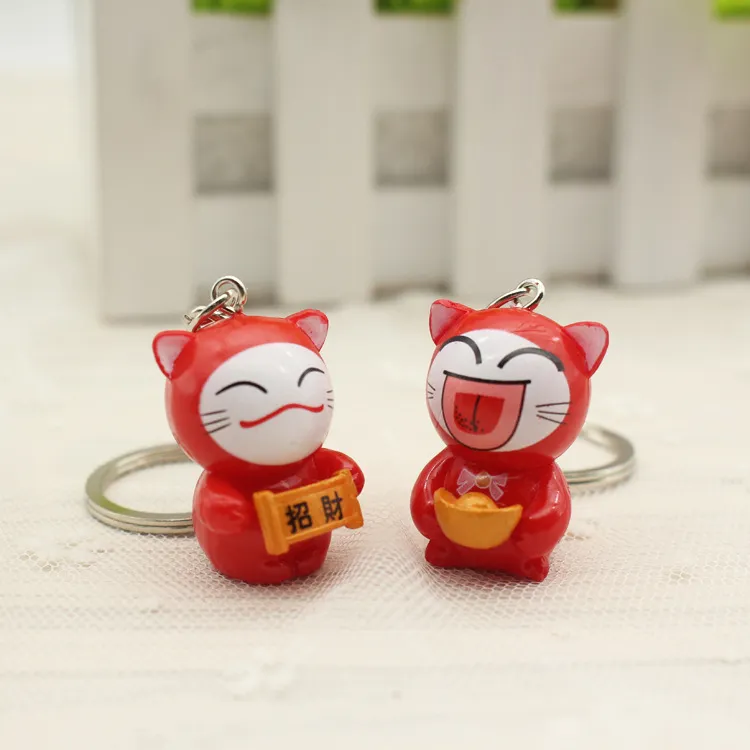 2018 Nyckelkedja Lovely Cartoon Maneki Neko Lucky Cat Mini Plastic Toy Keychain för Barngåva Purse Charms Pendant Key Ring