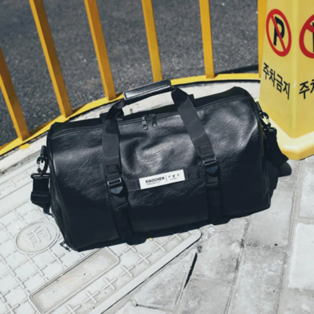 2021 New Leather Men Travel Bags Carry On Luggage Bags Women Duffel Totes Handbag Black Travel Tote Large Weekend Bag 2 Size From 25 85 DHgate