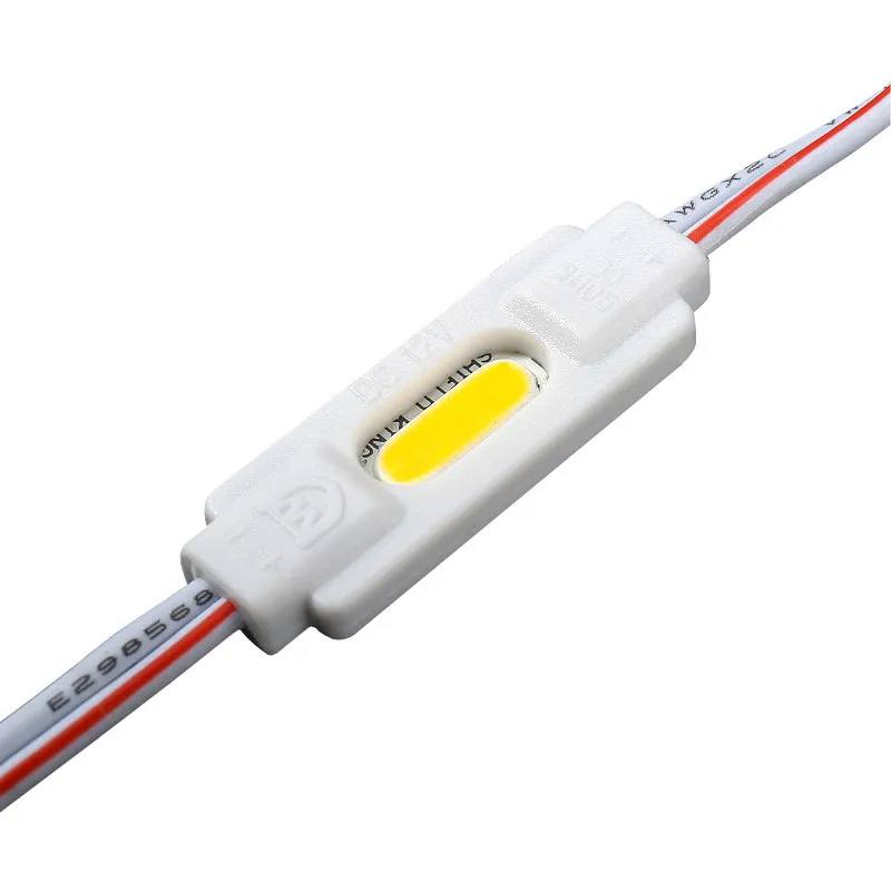 500 unids / lote DC12V 1.5W CRI85 COB LED Módulo INYECTO 12V Módulos impermeables 20pcs por cadena para publicidad